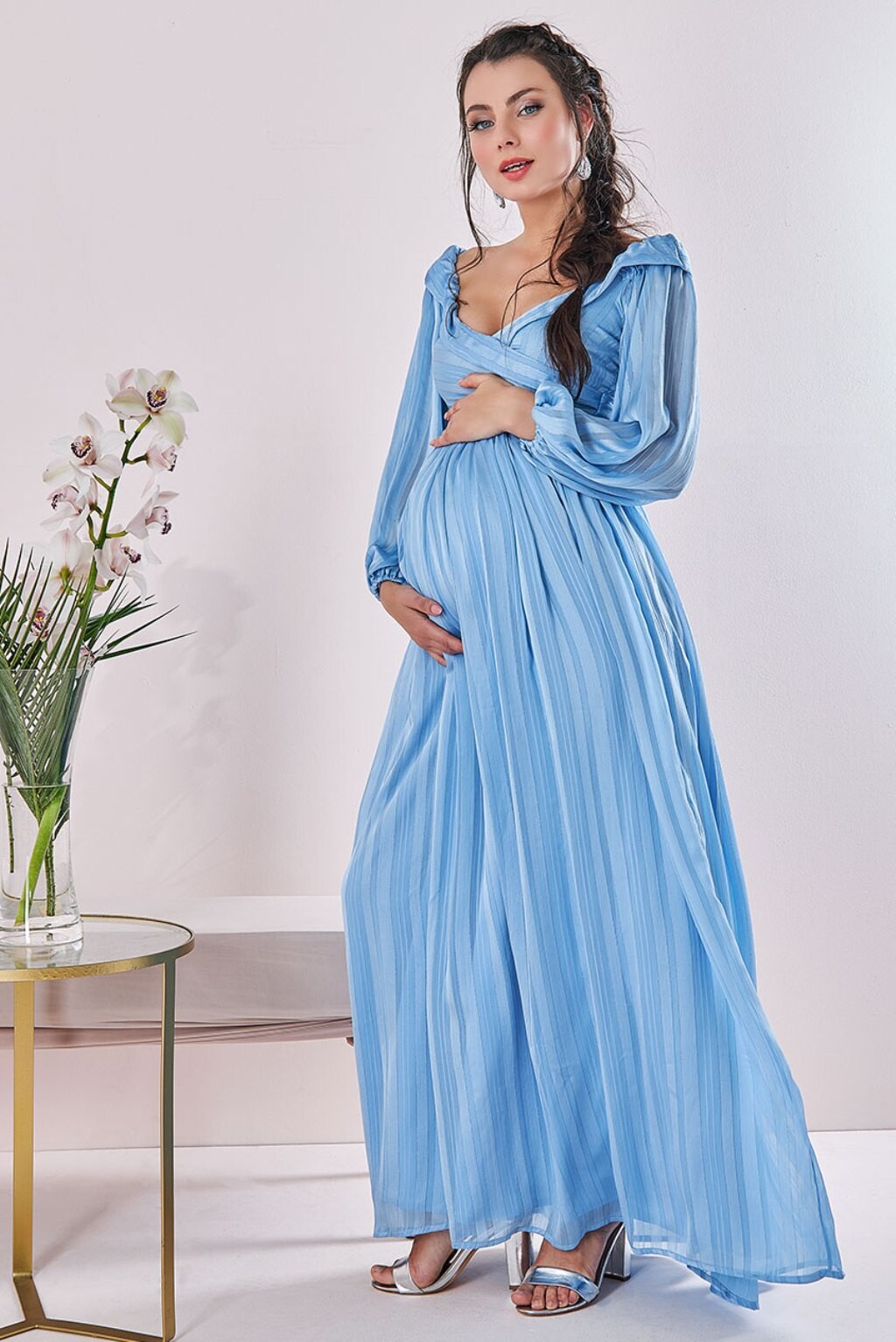 Poškodený tovar - Svetlomodré lesklé spoločenské šaty Veľkosť: XL